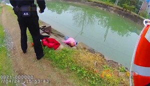 妇女大量饮酒后欲跳河轻生 民警及时阻止