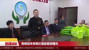 世界残疾人日：“无掌”青年为残疾孩子加油
