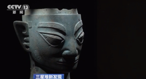 三星堆新发现丨脸戴面罩、头顶铜尊 这些奇特青铜头像是人是神？