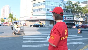 德阳：引导文明交通 志愿者在行动