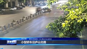 酒驾惹祸 汽车撞隔离栏上演“翻滚飞车”