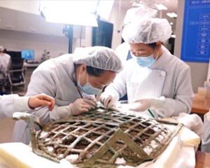 龟背形网格状器渐露真容 玉璧初现